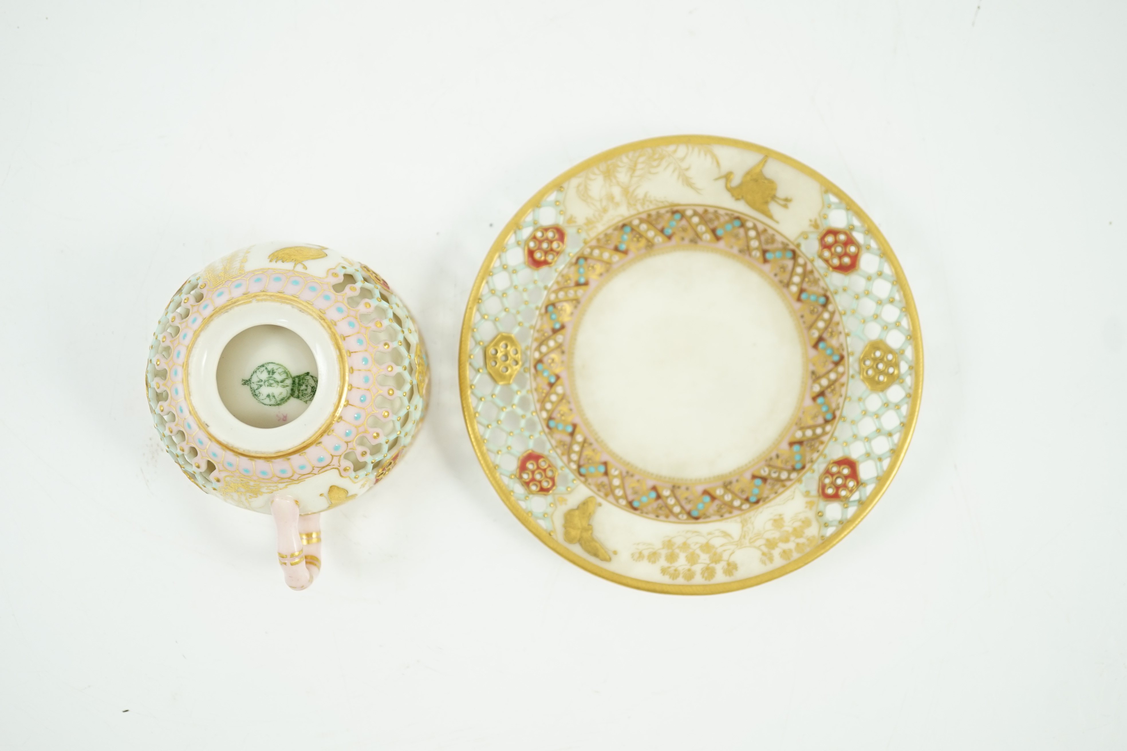 A Royal Worcester reticulated miniature cabinet cup and saucer, late 19th century